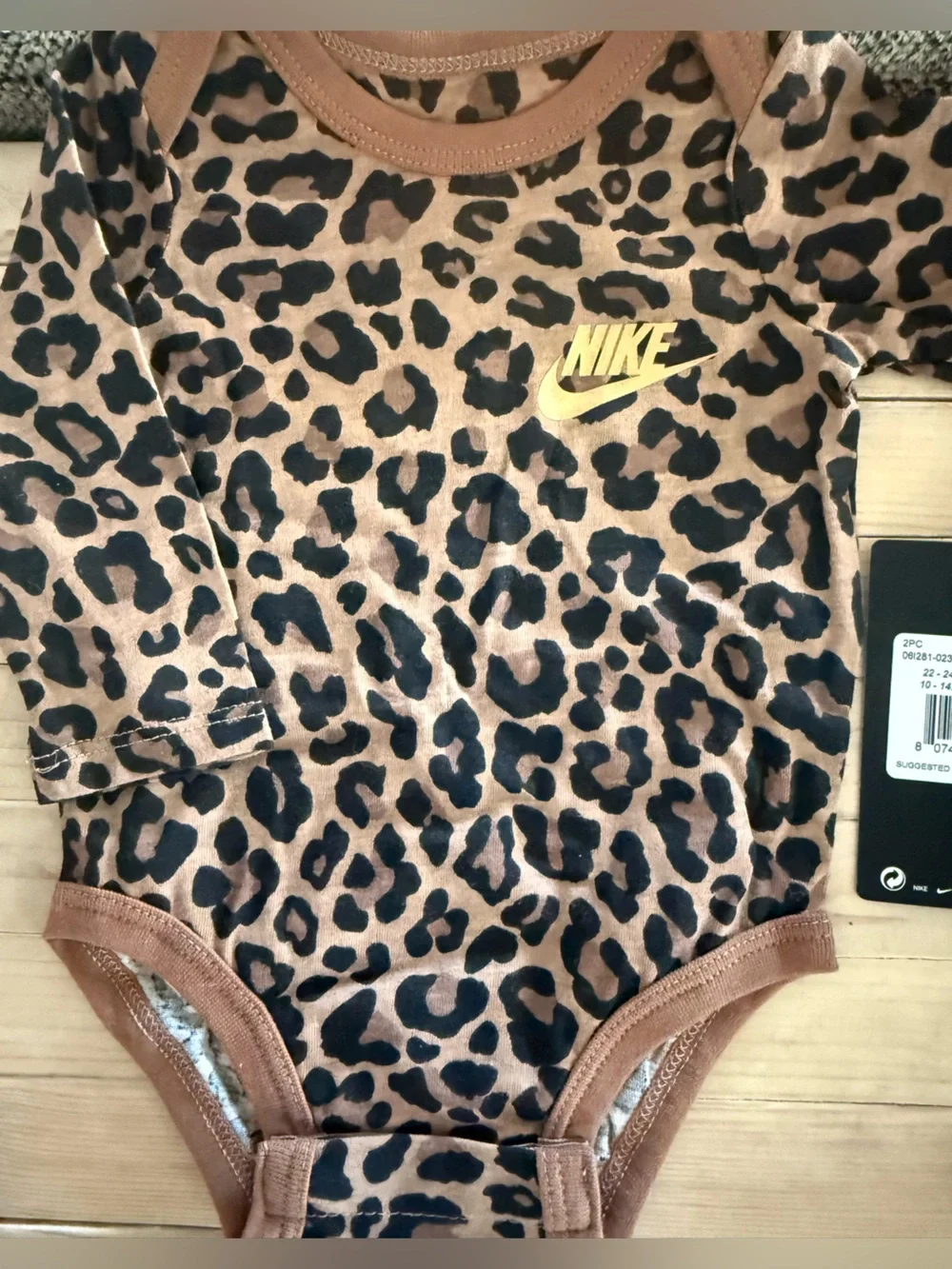 Nike Kids Leopard Print Leggings with Black Waistband and Gold Logo